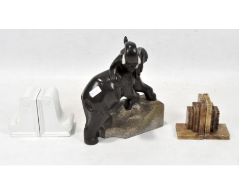 Two sets of bookends, one soapstone, one ceramic, together with a large figure of an elephant, 37cm high