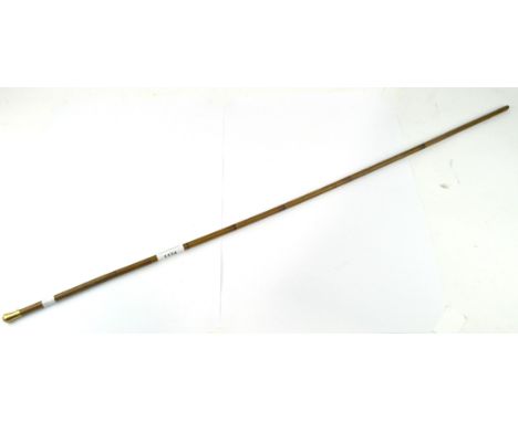 A Victorian yellow metal mounted swagger stick, the top engraved June 15th 1866, 83cm long.