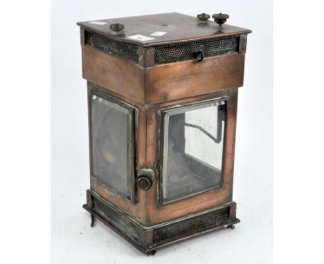 A Victorian copper ships lamp marked 'Bullpit & Sons 1900', with glass panels to three sides, the original burner present, he