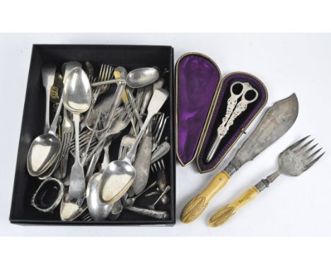 A collection of silver and silver plated flatware, to include a set of Victorian silver grape scissors, in original case, whi