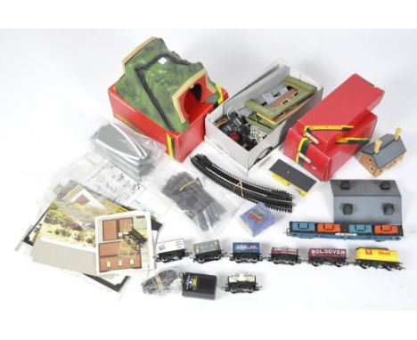 A collection of Hornby OO Gauge freight stock and accessories, including a R.071 'Modern Footbridge' in the original box and 