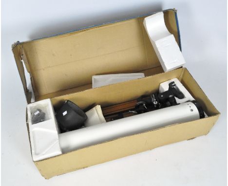 A mirror reflecting telescope, in original box with instructions