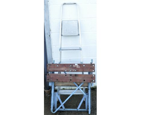 A Beldray 6 step ladder, 163cm high, together with a Black and Decker folding workmate.
