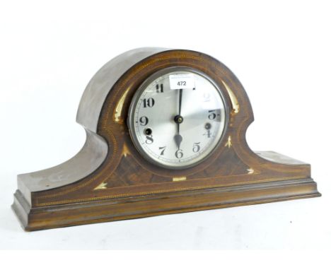 An early/mid 20th century mahogany veneered and inlaid mantel clock, the silvered dial with Arabic numerals denoting hours, 2