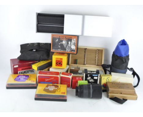 A selection of camera equipment and related items, including a Sightseer and a Bell &amp; Howell Co. lens, some in the origin