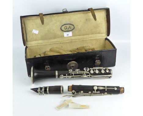 A Bb clarinet by F. Buisson, Paris, in a vintage leather box
