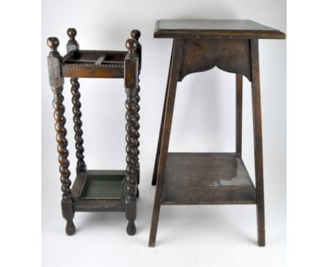 A late 19th/early 20th century mahogany occasional table, the square top attached to tapered supports and an open shelf below