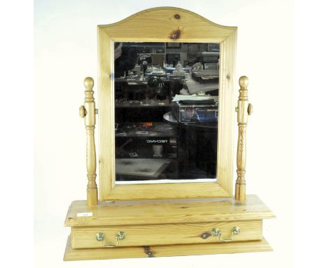 A modern pine dressing table mirror, the swing mirror on turned supports, with one long drawer, height 63cm