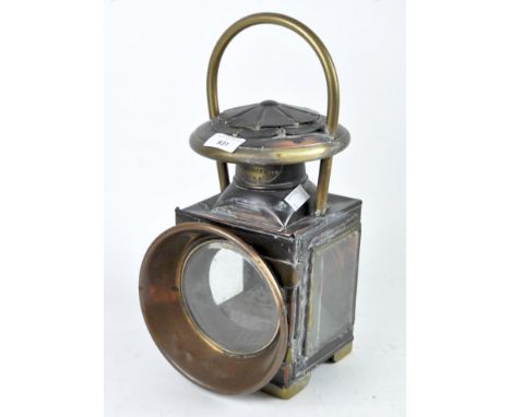 A Victorian Shand Mason & Co Fire Engine Makers brass and copper lamp, with 12cm lens, a carrying bale and a smoke hood, heig