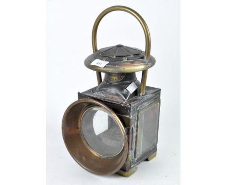 A Victorian Shand Mason & Co Fire Engine Makers brass and copper lamp, with 12cm lens, a carrying bale and a smoke hood, heig