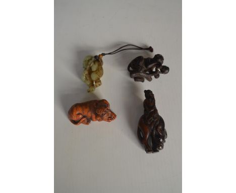 Four Japanese Netsuke Including One Jade