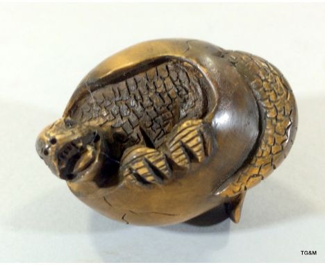Well carved Japanese netsuke in the for of a salamander
