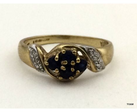 9ct gold ladies diamond and sapphire ring size O