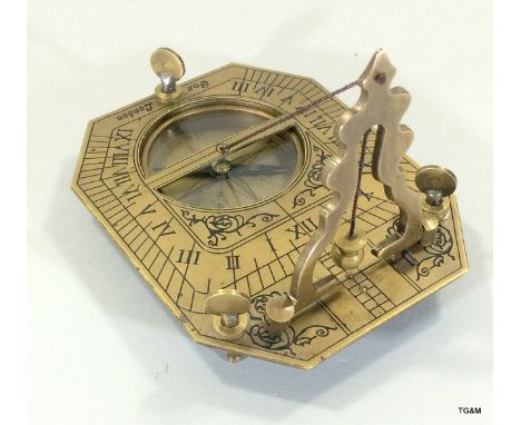 Brass cased sundial and compass