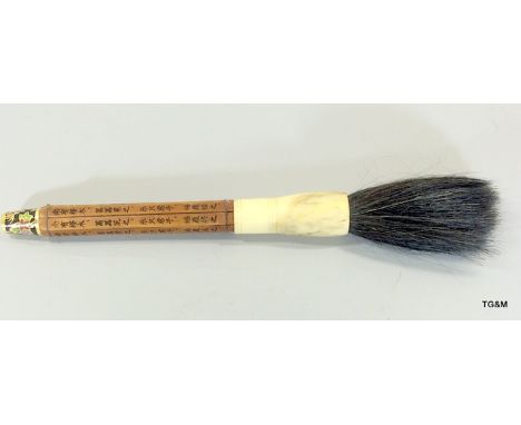 Chinese Calligraphy brush with bamboo handle bearing marks and cloisonne finial