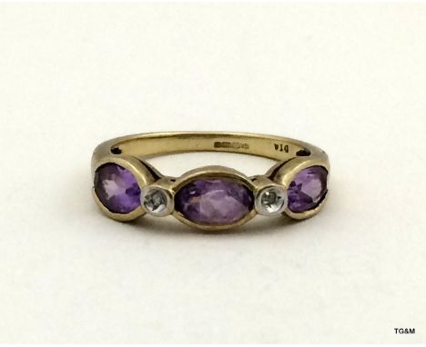 9ct gold ladies diamond and amethyst ring size N