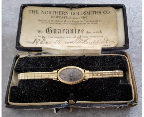 An 18ct gold lady's wristwatch, 17 jewel Swiss movement, silver engine turned dial, black Arabic numerals, original box inclu