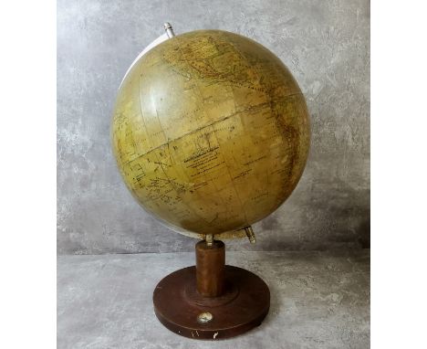 A 1930's German 'Räths Physikalischer Erdglobus' world globe, stainless steel support mounted a wooden base with inset compas