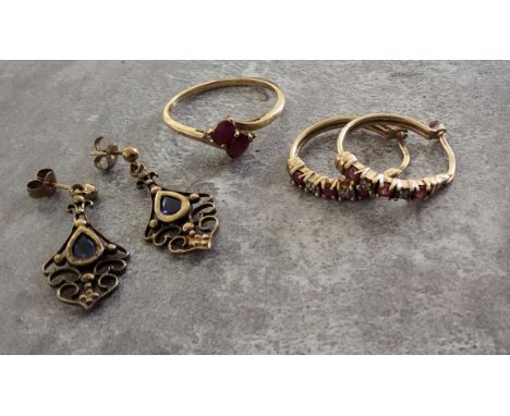 A 9ct gold ring claw set with two oval rubies &amp; diamond chips on a twist size?? 1.75g; a pair of 9ct gold hoop earrings s