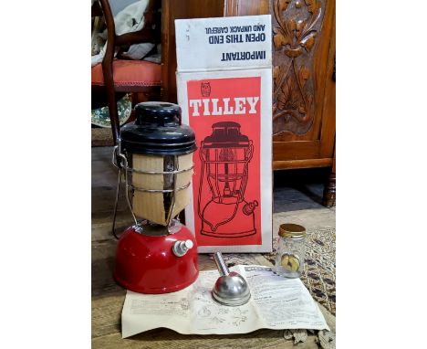 A Tilley storm light X246B, in original packaging, unused with accessories and instructions 
