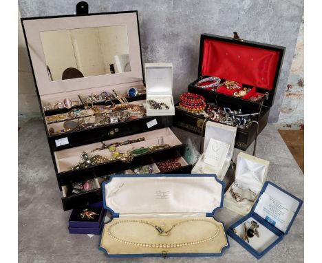 Two jewellery boxes containing costume jewellery including necklaces, earrings, bracelets etc.; a boxed Sekonda Seksy watch o