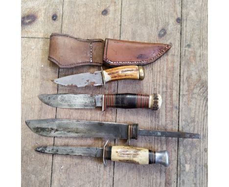 A Knife by Wade &amp; Butcher, Sheffield marked XCD, banded handle with antler finish; a Sheffield made dagger with sectional