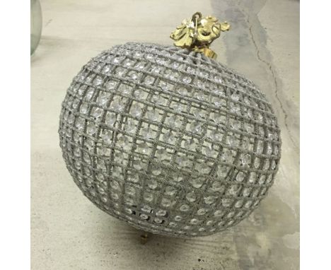 A large ball shaped beaded lamp shade. Approx 58cm high.