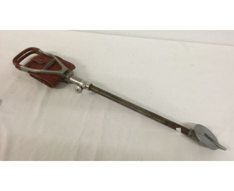 A vintage shooting stick.