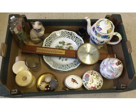 A box of assorted china, glass and a 1960's barometer.