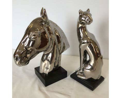 2 silver ceramic animal figures: 1) A horses head approx 28 wide x 32cm high, 2) A cat approx 12cm wide x 32cm high.