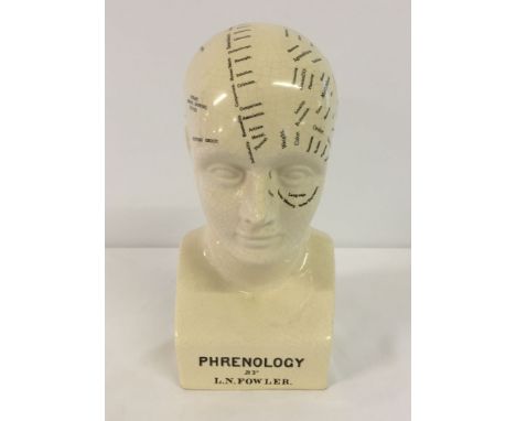 A ceramic phrenology head approx 27cm tall