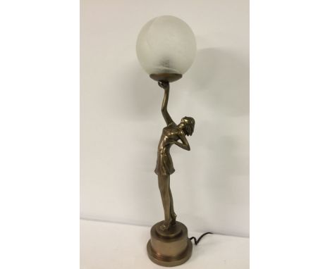 An Art Deco style reproduction ball lamp with glass shade. Approx 63cm high.