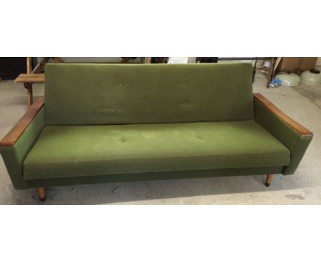 A green upholstered sofa-bed c1960-70's, 197cm wide