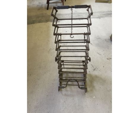 An old metal concertina ladder.