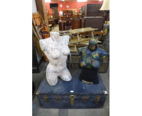 Two half mannequins and a travel trunk 