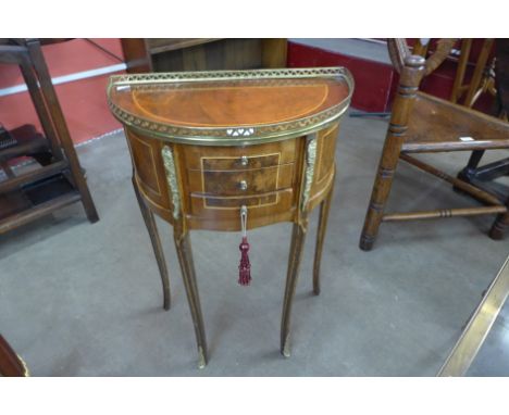 A French Louis XV style walnut and gilt metal mounted petit commode 