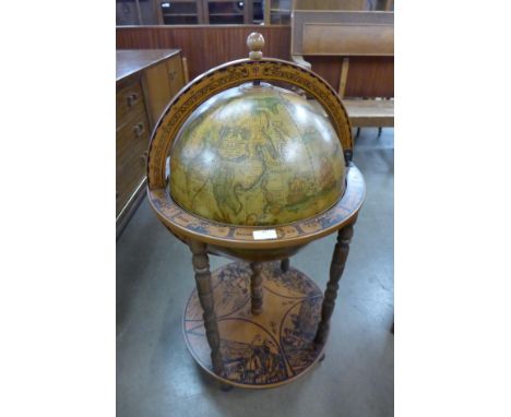 A terrestrial globe cocktail cabinet/trolley 