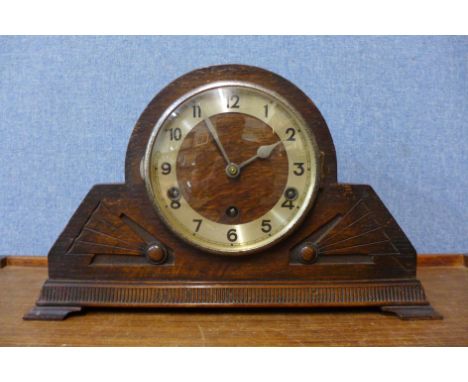 An Art Deco oak mantel clock 