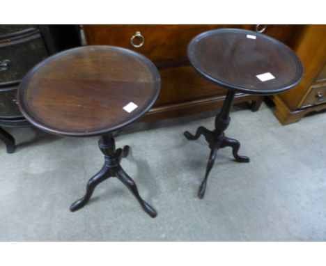 A pair of mahogany tripod wine tables 