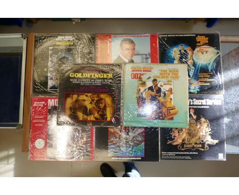 A collection of vintage James Bond records to include Dr. No 1C054-8 922, The Living Daylights 925 616-1, Goldfinger SLS50172