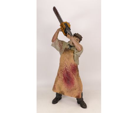 McFarlane Toys 18" figure of Leatherface from The Texas Chainsaw Massacre boxed. Possible break to chainsaw.