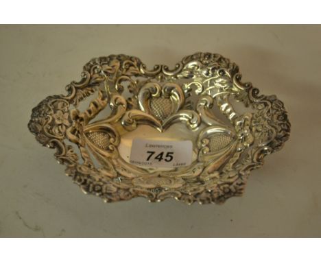 Oval embossed Birmingham silver trinket dish