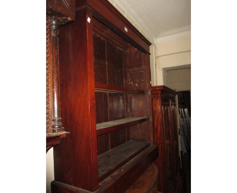 19th Century walnut three shelf open bookcase on a plinth base
