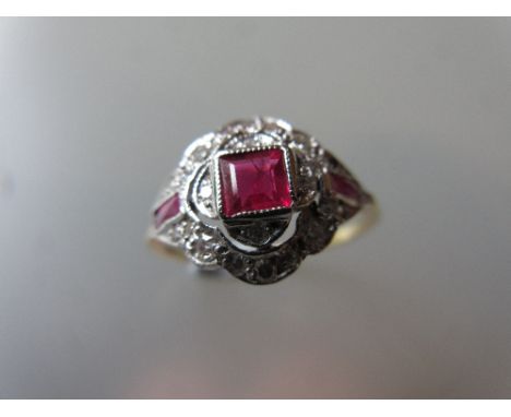 18ct Yellow gold, ruby and diamond cluster ring