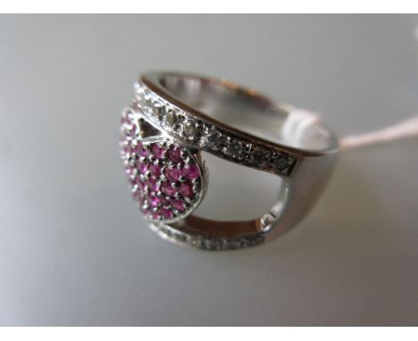 White gold ruby and diamond set heart form ring