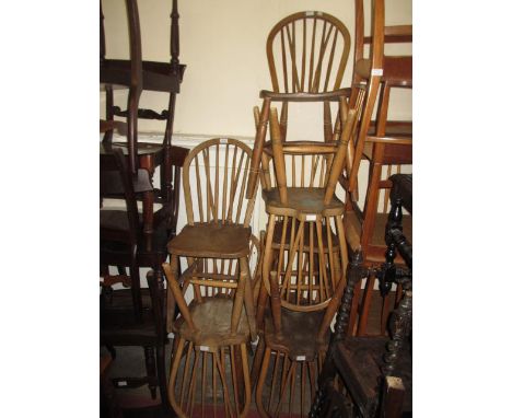 Set of eight early 20th Century beech and elm Windsor stick back dining chairs with panel seats and turned supports with stre