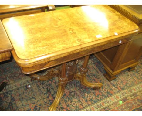 Good quality Victorian rectangular figured walnut marquetry inlaid foldover card table raised on four turned fluted supports 