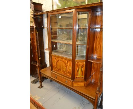Art Nouveau mahogany display cabinet with open shelves and turned uprights flanking a central glazed compartment above inlaid