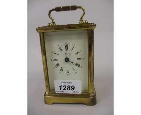 20th Century Asprey gilt brass carriage clock, the enamel dial with Roman numerals
