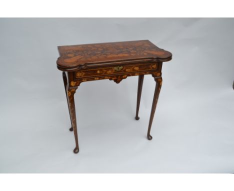 18th Century Dutch marquetry inlaid fold-over card table with a single frieze drawer raised on slender supports with pad feet